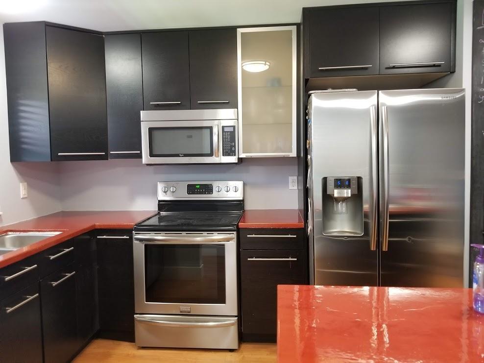Must see this beautifully remodeled 2 bedroom 2 bathroom condo with washer and dryer in the unit. Freshly painted with a neutral color. Features laminate and tile throughout, cook island, stainless appliances, step-in shower in the master, split bedroom plan, and covered screened balcony with garden and water views. Water included. Community offers pool, bbq area, clubhouse, and table tennis. Owner will pay association security deposit. 2 car limit. Close to beaches, restaurants, and shopping. Must see!