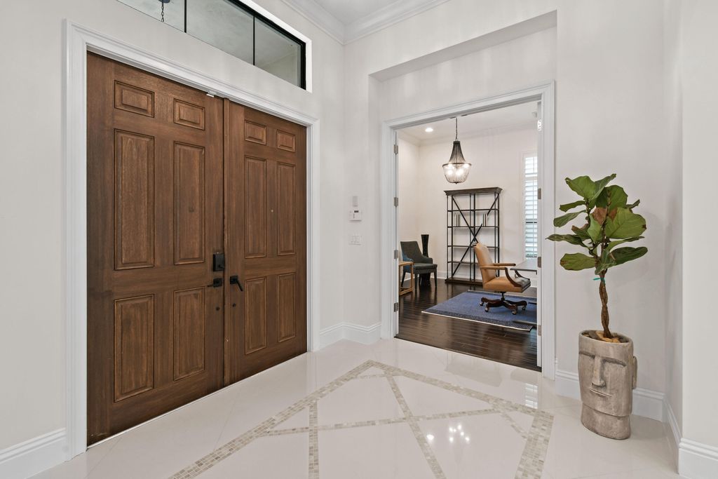 Photo of 145 Gardenia Isle Drive, Palm Beach Gardens, FL 33418 (MLS # R11045624)