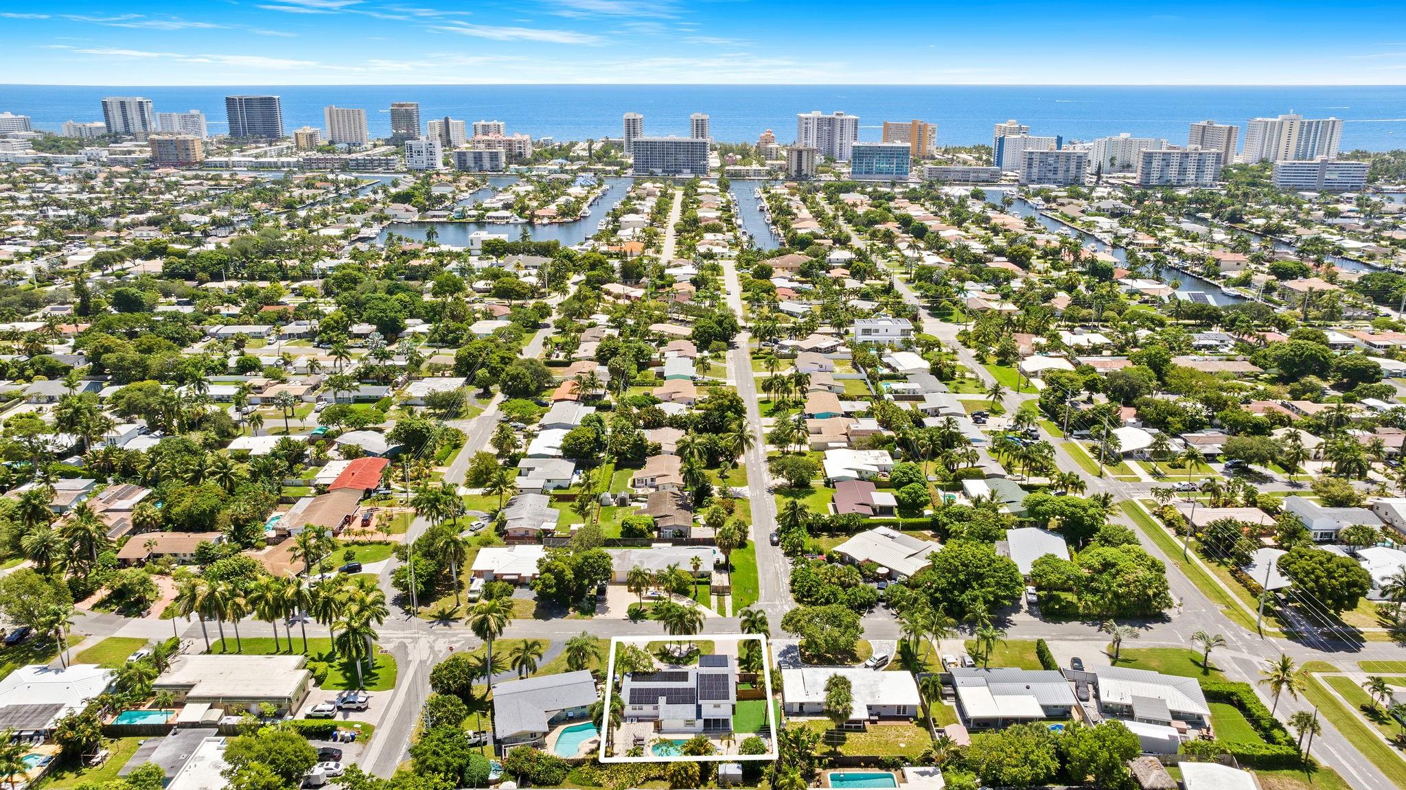 Just minutes from the sand & upscale, walkable Pompano Beach Pier! This fully furnished, spacious property with modern renovations features 2 independent units, each w/ private entrance & separate in-unit washer / dryer. Main house: 4 beds / 2 baths, snack bar, breakfast nook, formal dining & split-plan, primary bedroom w/ walk-in closet & shower. Outdoor: heated pool, wood patio, BBQ, paver lounge, outdoor dining & a covered patio w/ ping-pong. Guest suite: 1 bed / 1 bath w/ its own private balcony & fully fenced private yard. Together nearly 2,000 SF of stylish comfort + sleek tile floors, bright open-concept living & modern kitchens with stainless steel appliances. Impact windows & doors and central A/C units throughout. Wraparound driveway, ample parking. Family-friendly neighborhood!