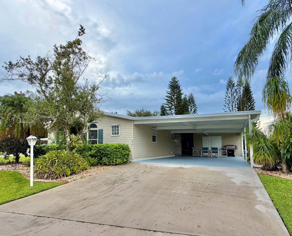 Photo of 8110 9th Hole Drive, Port Saint Lucie, FL 34952 (MLS # B26077229)