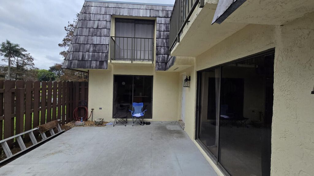 Photo of 1660 Forest Lakes Circle #C, West Palm Beach, FL 33406 (MLS # R11156711)