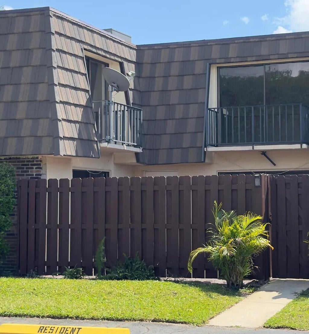 Photo of 1660 Forest Lakes Circle #C, West Palm Beach, FL 33406 (MLS # R11156711)
