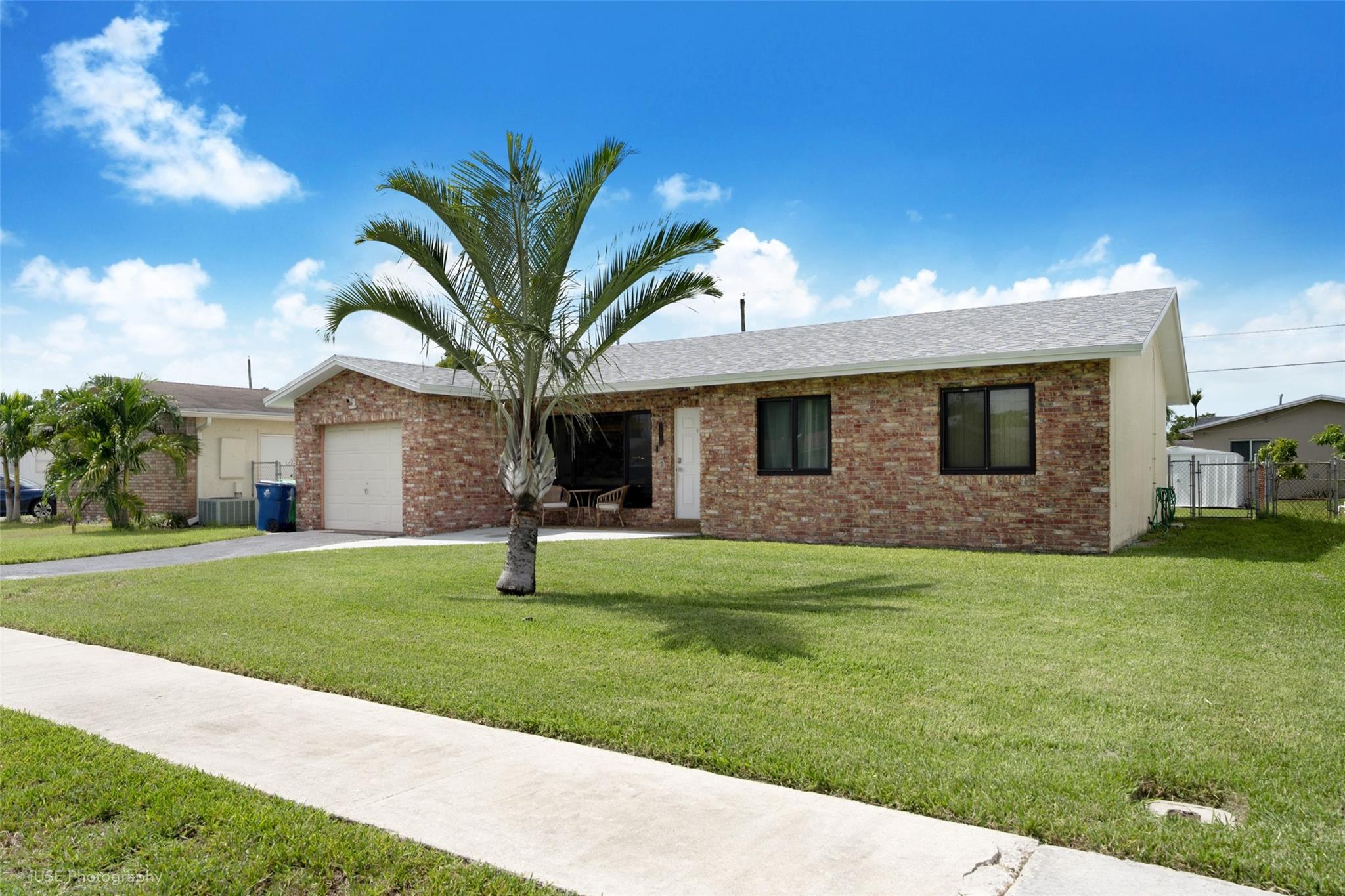 Welcome to the kind of home that checks every box and then adds a few surprises! This beautiful 3-bedroom, 2-bath gem is not only updated—it’s glowing with modern charm. With ceramic tile floors recently installed, a roof and A/C both less than a year young, and sparkling updated bathrooms, this home feels brand new. Impact windows wrap the house in peace and quiet, while the spacious backyard—just begging for a future pool party—offers endless possibilities. Nestled in a tranquil, HOA-free neighborhood close to shopping and major roads, this is the ideal setting for first-timers, future families, or anyone who wants a stylish, stress-free retreat. Come see where your next chapter begins!