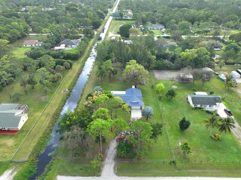 Photo of 11286 57th Road N, The Acreage, FL 33411 (MLS # R10955543)