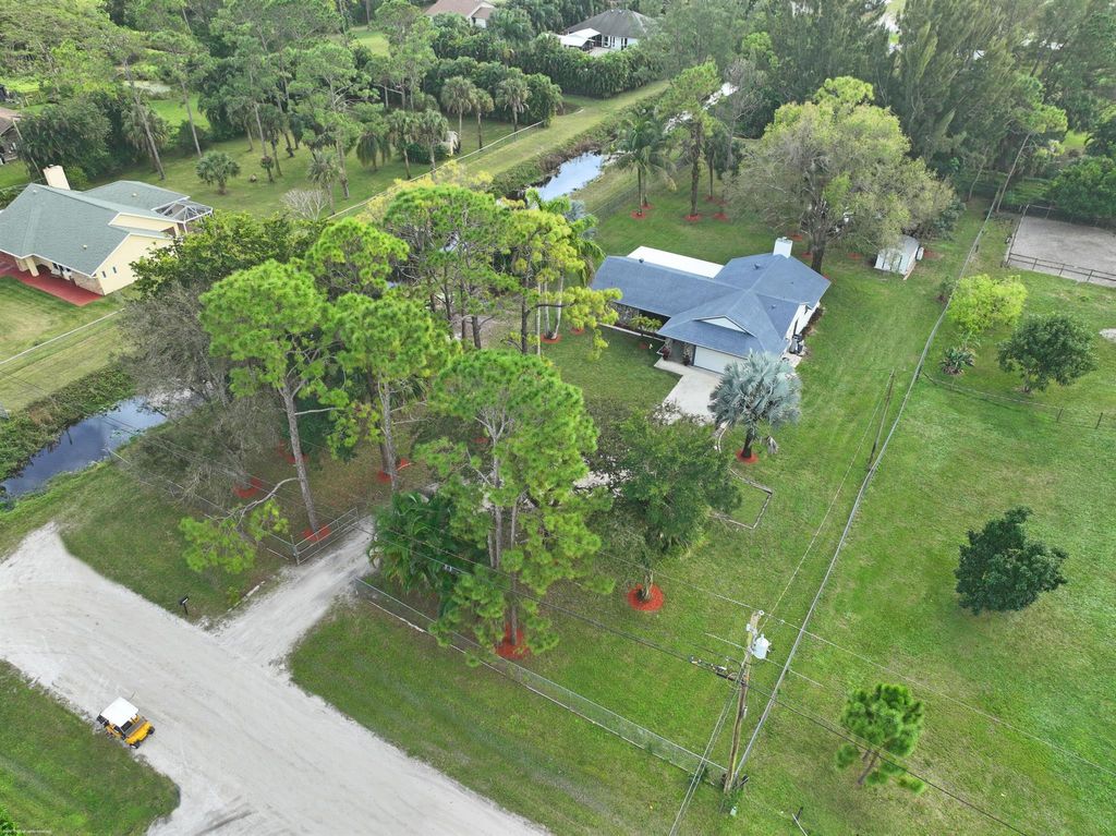 Photo of 11286 57th Road N, The Acreage, FL 33411 (MLS # R10955543)