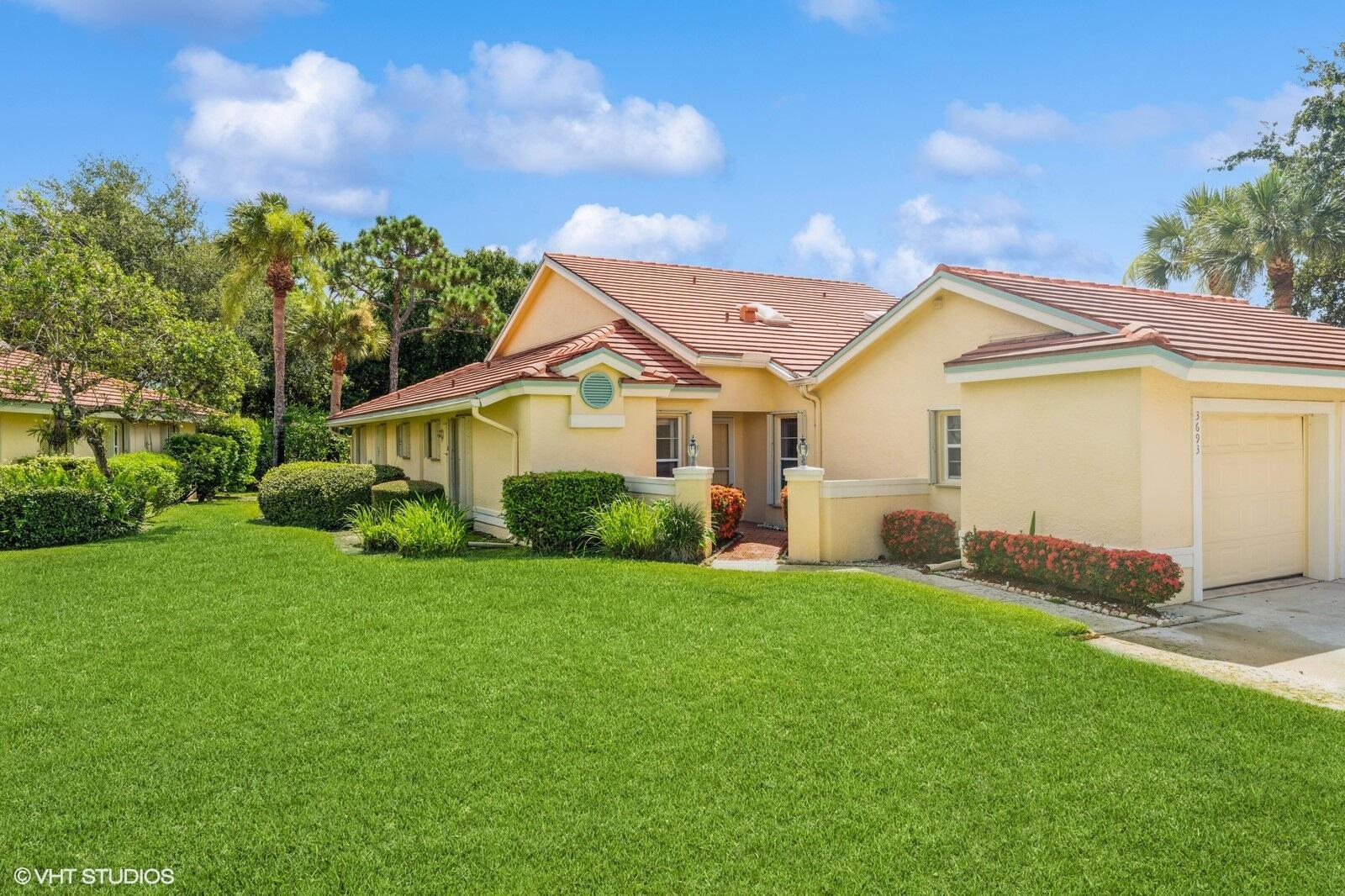 Enjoy easy living in the highly sought-after gated 55+ community of Whispering Sound. This well-maintained 2-bedroom, 2-bath home offers a spacious, light-filled layout with high ceilings, a screened-in patio, and a split-bedroom floor plan for added privacy. The primary suite features dual closets and a large en-suite bath with separate shower and soaking tub. Located just steps from the clubhouse, this home provides convenient access to the pool, spa, fitness room, and active social calendar. HOA includes exterior maintenance, roof, cable, internet, landscaping, and morea"making this a true lock-and-leave lifestyle. Minutes from charming downtown Stuart, shopping, dining, and medical facilities.
