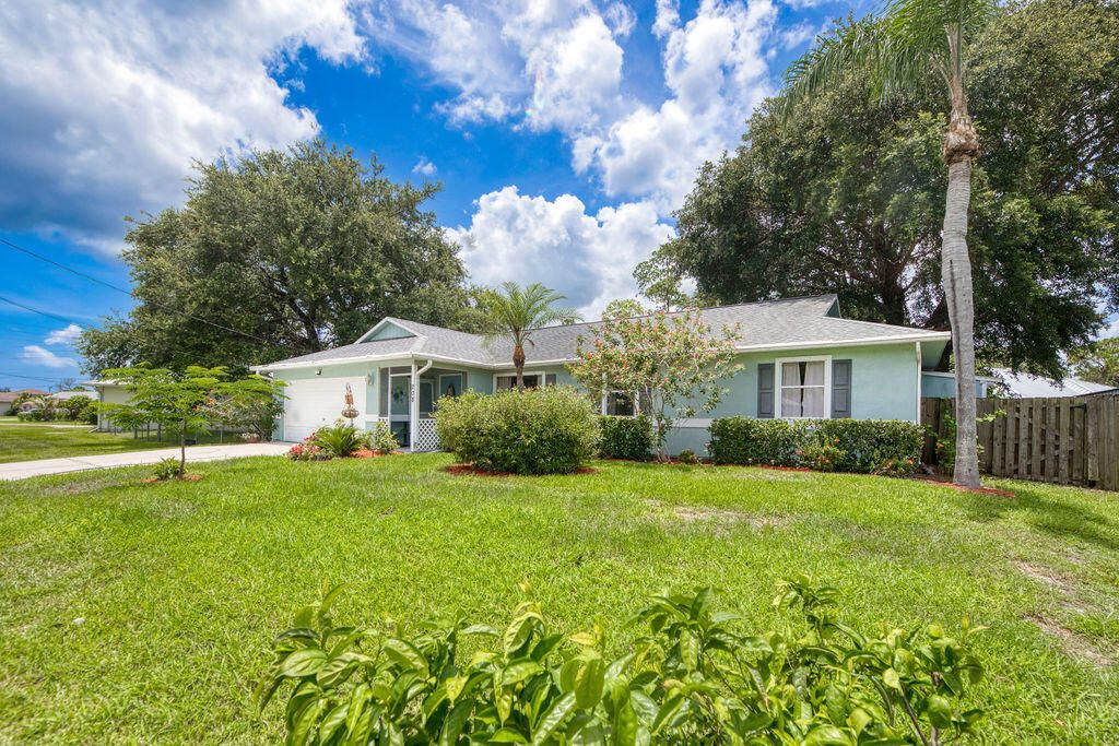 Photo of 208 SE Sims Circle, Port Saint Lucie, FL 34984 (MLS # R11098857)