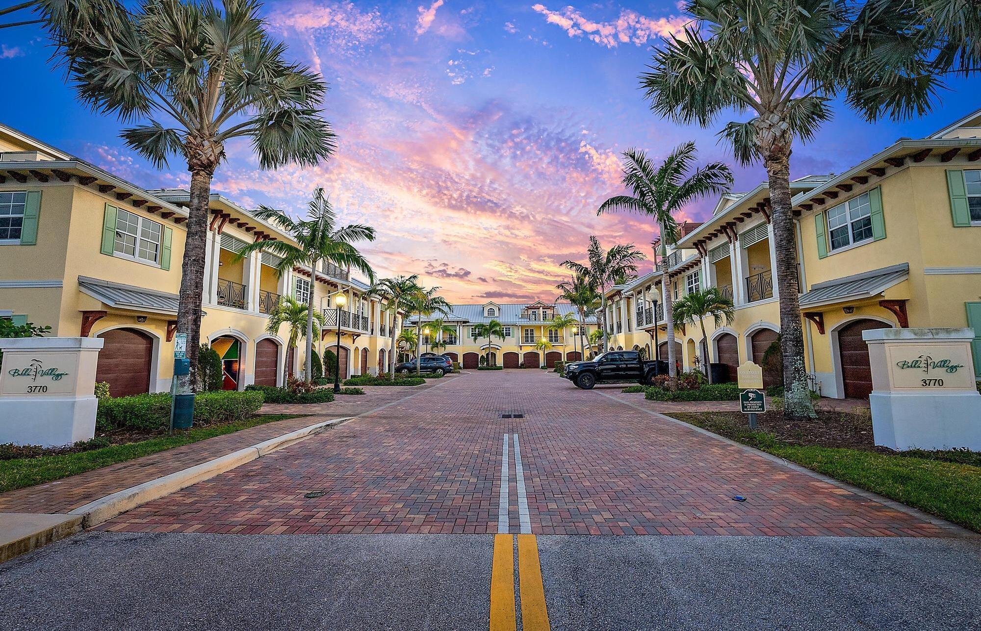 Introducing Bella Villaggio -- an exclusive enclave of just 16 luxury townhomes built in 2017. For the first time ever, this exceptional residence is being offered for sale. This impeccably maintained, three-story townhome features 4 spacious bedrooms, 3 full bathrooms, and over 2,200 square feet of refined living space. Thoughtfully designed with upscale finishes, the home boasts a private two-car garage, a durable metal roof, full hurricane-impact windows and doors, natural gas service, and a stunning rooftop terrace offering sweeping views of the Intracoastal Waterway.