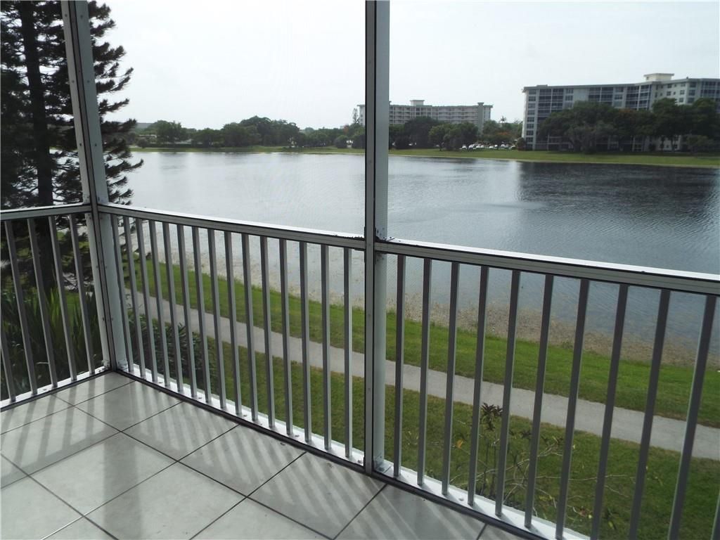 Photo of 2801 N Palm Aire Dr #306, Pompano Beach, FL 33069 (MLS # F10298353)