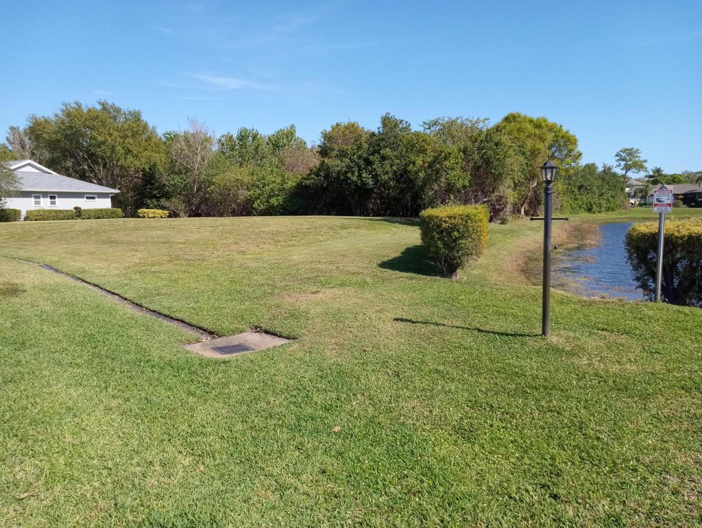 Photo of 630 E Pointe Ct Ct SW, Vero Beach, FL 32962 (MLS # B26011476)