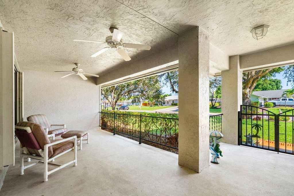 Photo of 61 W Rubber Tree Drive, Lake Worth, FL 33467 (MLS # R11100242)