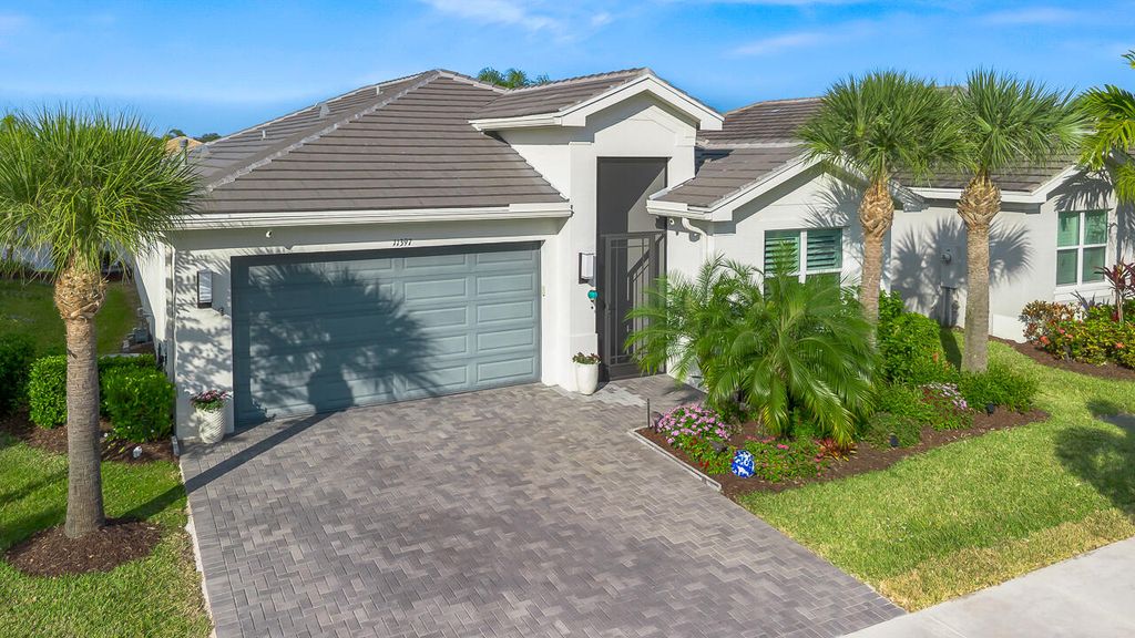 Photo of 11397 SW Carlisle Crossing Avenue, Port Saint Lucie, FL 34987 (MLS # R11147167)