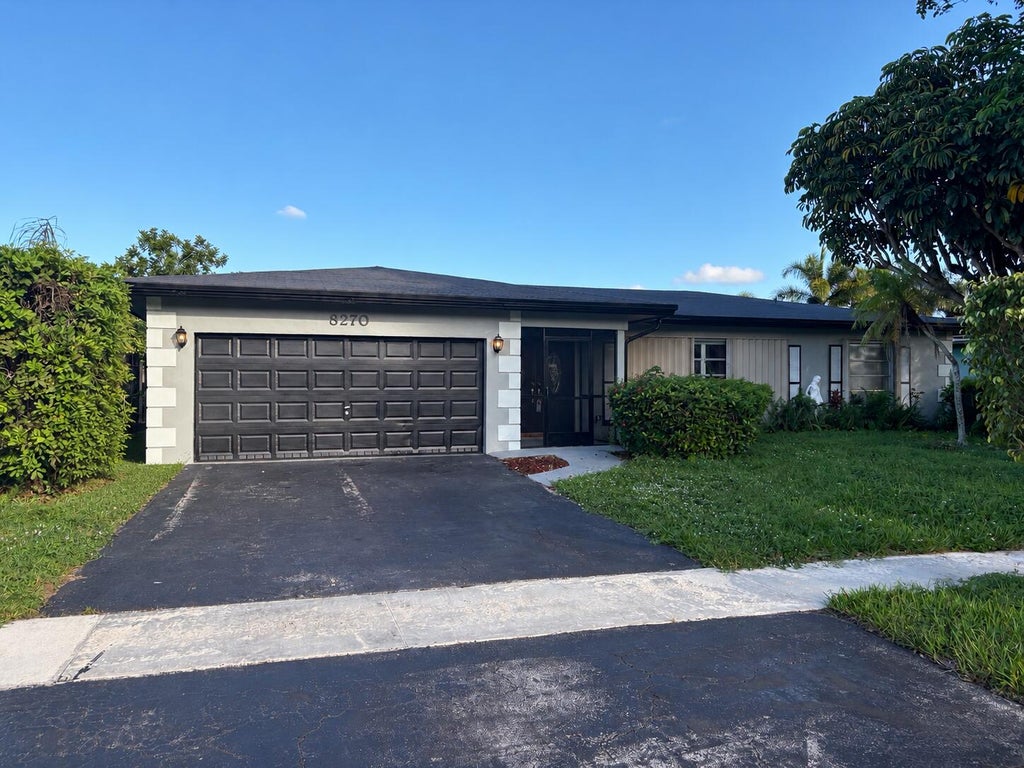 Photo of 8270 NW 66TH Terrace, Tamarac, FL 33321 (MLS # B26094777)
