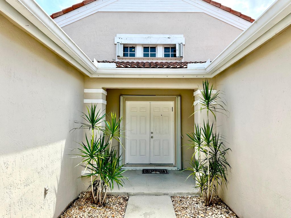 Photo of 386 Carrington Drive, Weston, FL 33326 (MLS # B26025229)