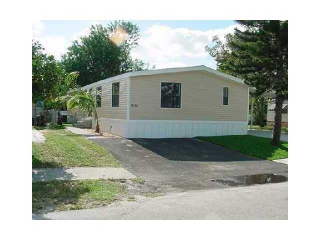 HONEY STOP THE CAR!! THIS IS THE BEST DEAL. YOU GET A true 5 BED AND 2 BATH HOME FOR THE PRICE OF A 3 BED/2 BATH !! BRAND NEW AC, FENCED YARD, NEW FLOORS, NEW PAINT. VAULTED CEILINGS. THE MASTER HAS WALK-IN CLOSET & BATH HAS DUAL SINKS, ROMAN TUB AND SEPARATE SHOWER. Brand new eat-in KITCHEN white Shaker with Quartz Counter-tops, and large pantry in kitchen. Separate Laundry Room with new upgraded Washer and Dryer v NEW WASHER. BRAND NEW KITCHEN WITH QUARTZ COUNTER-TOPS New flooring, completely refurbished, newly painted, backs up to water (no backyard neighbors), great A+ schools: Coral Sunset, Loggers Run Middle, West Boca High. Close to shopping.