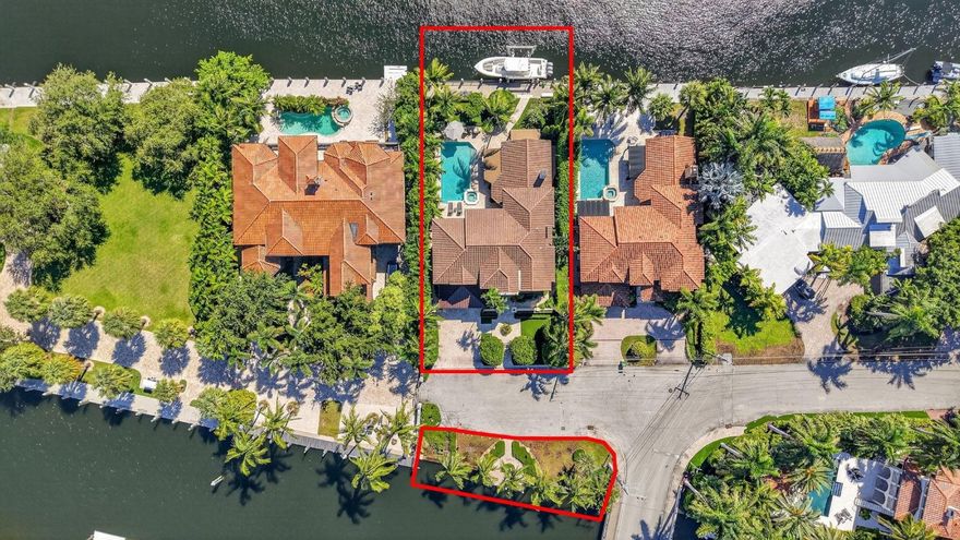 Unique, private & rare location in guard-house secured Seven Isles. Spectacular private cul-de-sac setting, 3rd home from Intracoastal, next door to fenced point estate, no neighbors directly across. Beautifully presented deepwater residence with dual waterfront access totaling 150': 75' deeded waterfront with dock & 25K lb lift plus 75' waterfront access rights with dock on opposite side. Private pool. Newly painted, new roof 2021. Custom details & professional interior design. Flexible floorplan, large great room, amazing chef's kitchen, Viking appliances, double island, large living room, high custom ceiling, breakfast area + formal dining. 1st level:2 bedroom suites (currently gym & office). 2nd level:luxurious primary suite, spa-style bath, large custom closet + 2 large bedroom suites Renovations completed in 2021 including new exterior paint and new roof by Allied Roofing.Tankless water heater 2021.Home security includes exterior and dock camaras.Impact windows and doors throughout.UV film added downstairs and primary suite in 2022.Sonos system.Kitchen appliances are all Viking with additional under counter beverage KitchenAid refrigeration in the second island. New icemaker in kitchen bar area 2024.Custom cabinetry in the media/living room.Electronic shades in the media/living room and primary suite.Steam shower in first level bathroom.Bathroom doubles as cabana/pool bath (bedroom 5 currently used as workout room).Added upstairs laundry room 2022.Saltwater heated pool and new pool pump 2022.All upstairs baths updated in 2022.New air conditioner handler for second floor in 2022. Replaced fan for first floor air conditioner fan in 2925. Air handlers serviced in May 2025.Additional roof insulation in 2024.Garage has mini-split refrigeration & built in cabinetry.Seawall maintenance in 2022.New landscaping and lighting to the front of the residence in 2022.