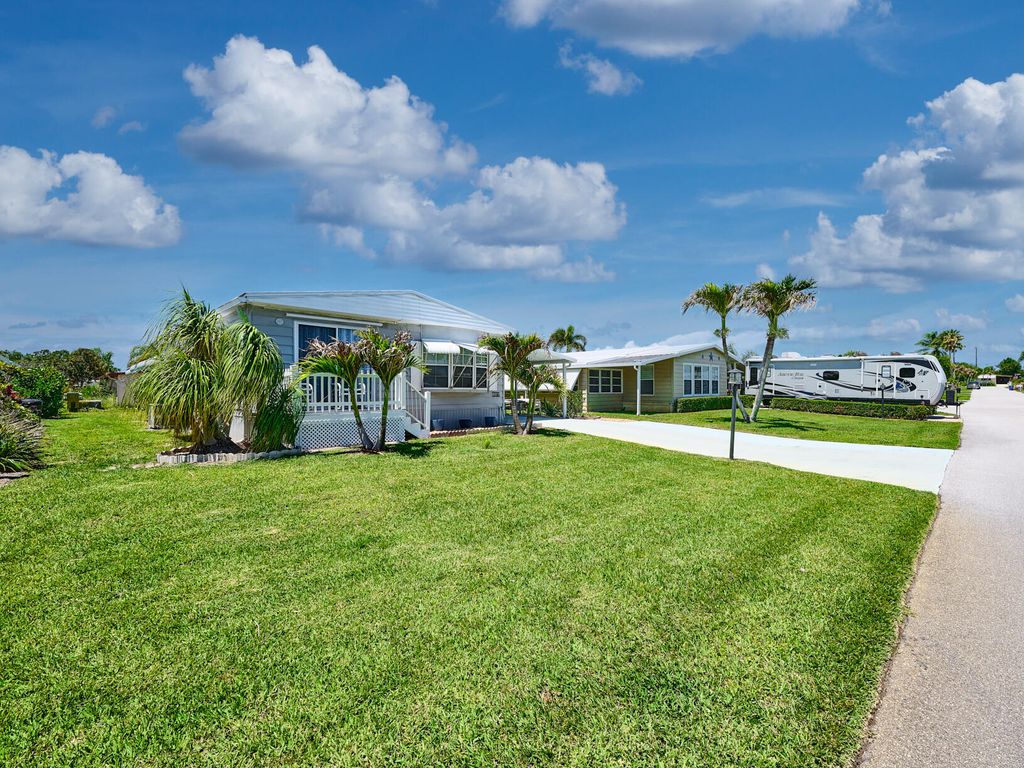 Photo of 6977 SE Delegate Street, Hobe Sound, FL 33455 (MLS # B26032373)