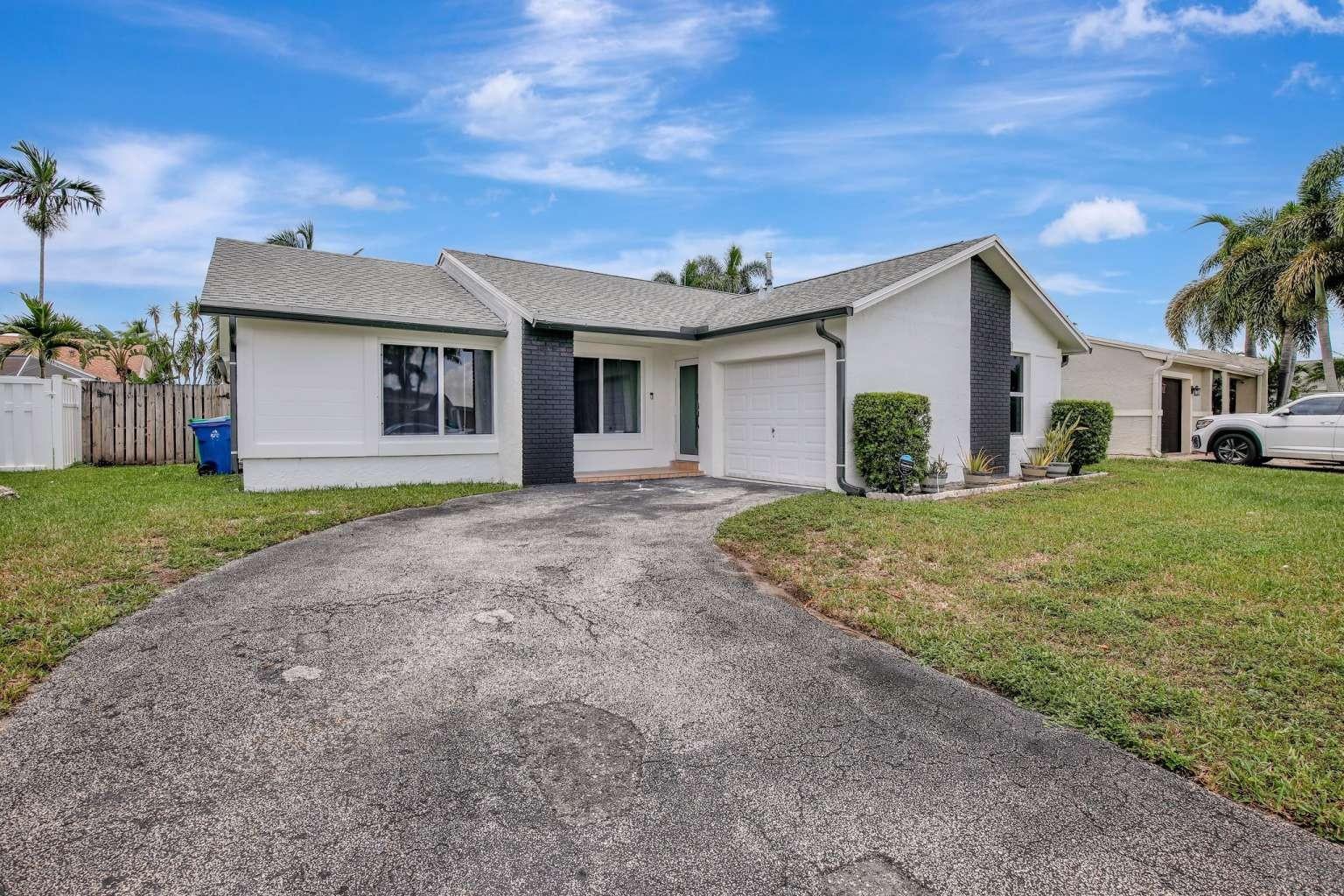 Beautifully Renovated 3- bedroom Pool Home in Sunrise located in a quiet, friendly neighborhood. No HOA. This move in ready property features modern upgrades and offers a perfect balance of comfort and convenience. Enjoy long-term peace of mind with major updates already completed: New impact windows for storm protection and energy efficiency 8 year old roof, 7 year old A/C and water heater New LED lighting throughout the home Private, fully fenced backyard with a sparkling pool- perfect for relaxing or entertaining Situated just minutes from Sawgrass Mills, top - rated schools, dining and major highways- this homes ideally located for easy living.