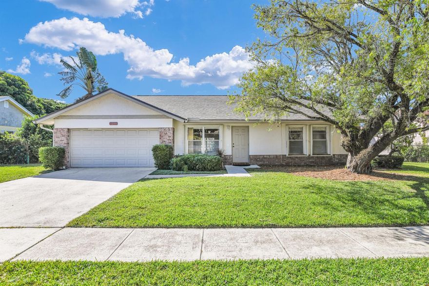 LOCATION, LOCATION LOCATION! Discover this 4 Bed, 2 Bath Waterfront Home with Pool & two car garage in the highly desirable Sky Lake Community - Just 2.5 miles from the beach and close to everything South Florida has to offer: Fine Dining, Entertainment, Shopping. Close to Delray Beach, Fort Lauderdale, Miami & West Palm Beaches! This Home Features: a BRAND NEW ROOF, New, A/C, New Hot Water Heater, New Pool Filter, New Diamond Brite Pool Resurface, Hurricane Garage Door & Accordion Shutters throughout. Full property Irrigation system with FREE water from the lake. The spacious property has plenty of room for all of your outdoor toys - RV's, Boats and Jet Ski's are all welcome! Residents of Sky Lake also enjoy access to a community dock on the C. Stanley Weaver Canal