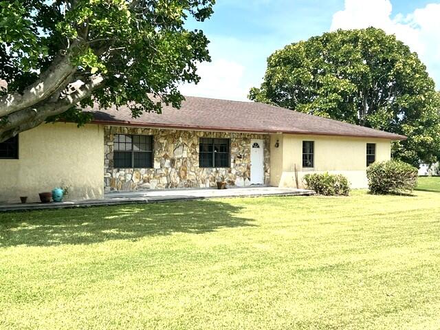 Photo 1 of 19 — 36911 3rd Street, Canal Point, FL 33438