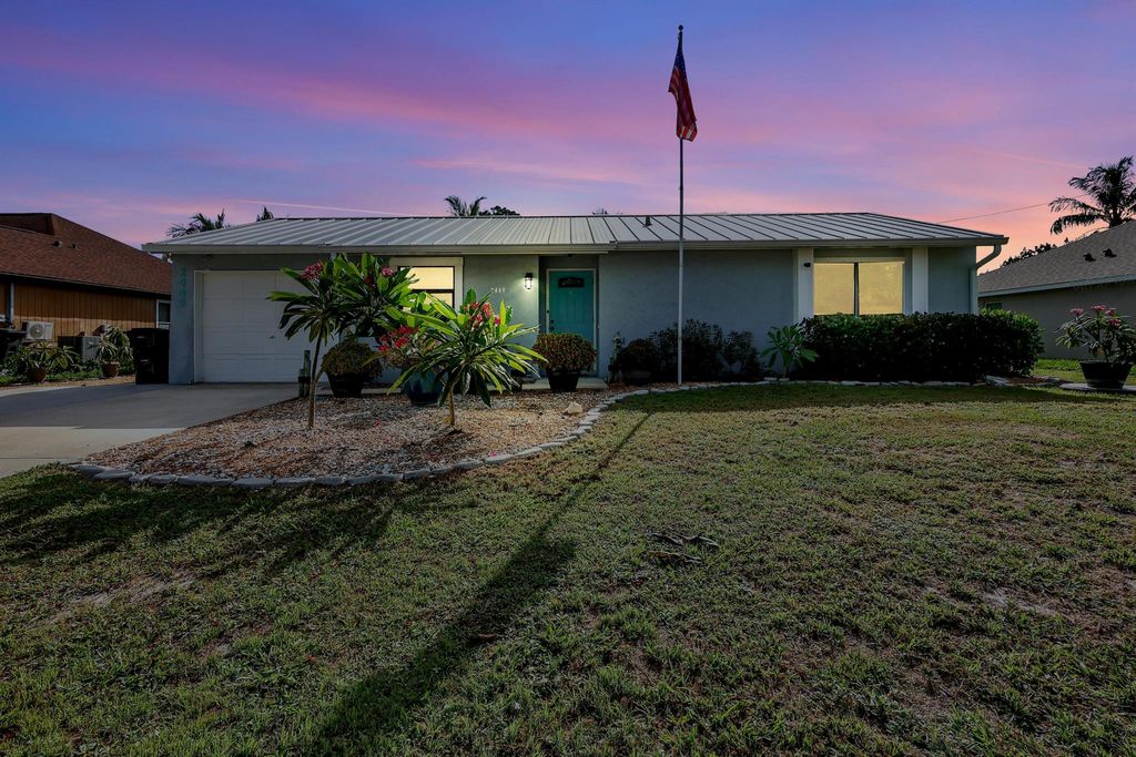 Photo of 2449 SW Cooper Lane, Port Saint Lucie, FL 34984 (MLS # R11004819)