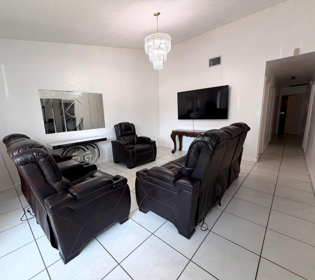 Photo of 3768 Mil Lake Court, Greenacres, FL 33463 (MLS # B26046208)