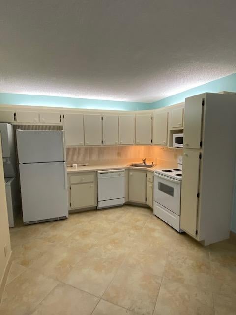Photo of 201 Foxtail Drive #C1, Greenacres, FL 33415 (MLS # B26064082)