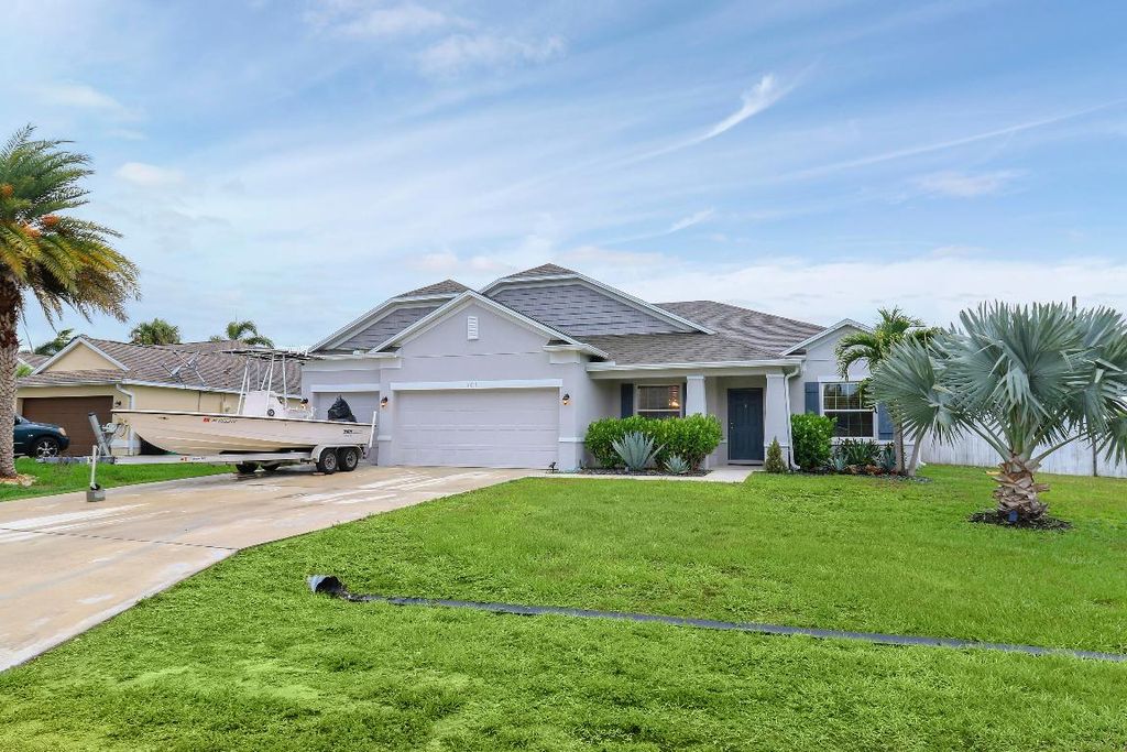 Photo of 601 SW Kayak Avenue, Port Saint Lucie, FL 34953 (MLS # R10996213)