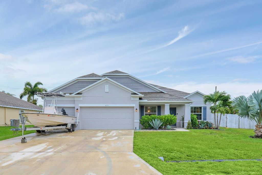 Photo of 601 SW Kayak Avenue, Port Saint Lucie, FL 34953 (MLS # R10996213)