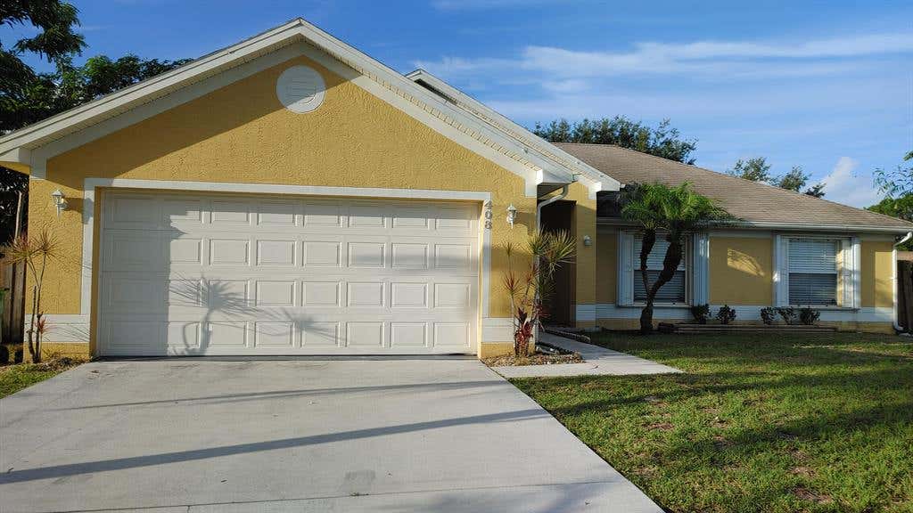 Photo of 408 SW Exmore Avenue, Port Saint Lucie, FL 34983 (MLS # R10730396)