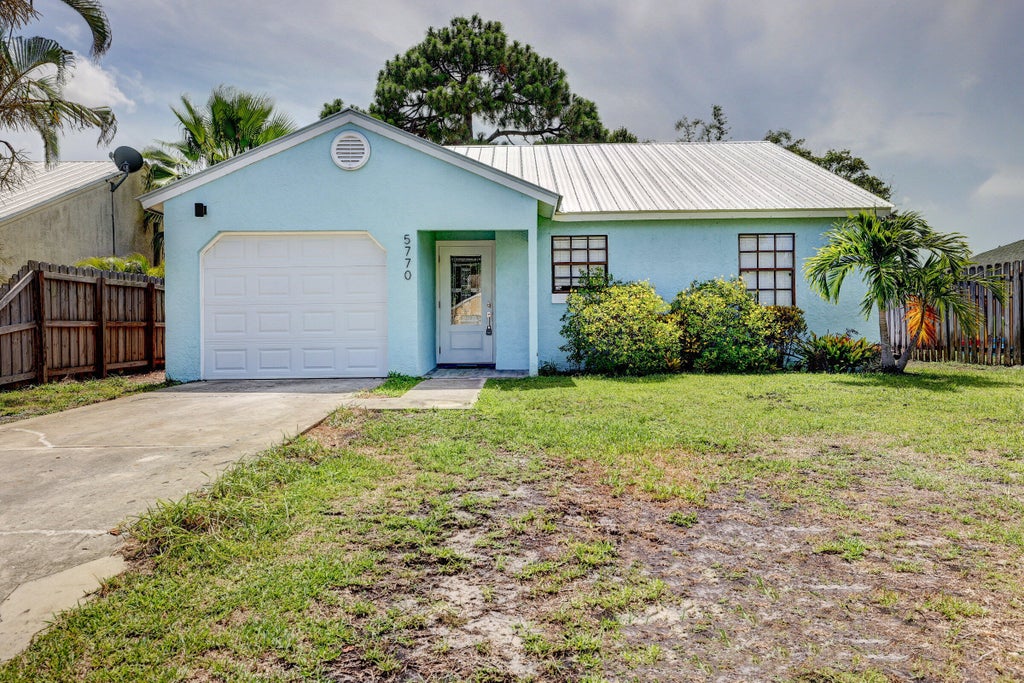Photo of 5770 SE WILSIE Drive, Stuart, FL 34997 (MLS # B26063394)