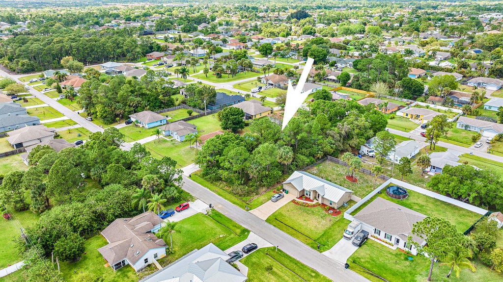 Photo of 1241 SW Herald Road, Port Saint Lucie, FL 34953 (MLS # R10785183)