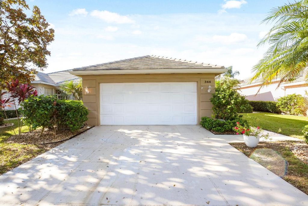 Photo of 344 NW Bentley Circle, Port Saint Lucie, FL 34986 (MLS # R11134828)
