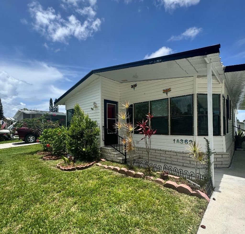 Photo of 14362 Cancun Avenue, Fort Pierce, FL 34951 (MLS # R11099477)