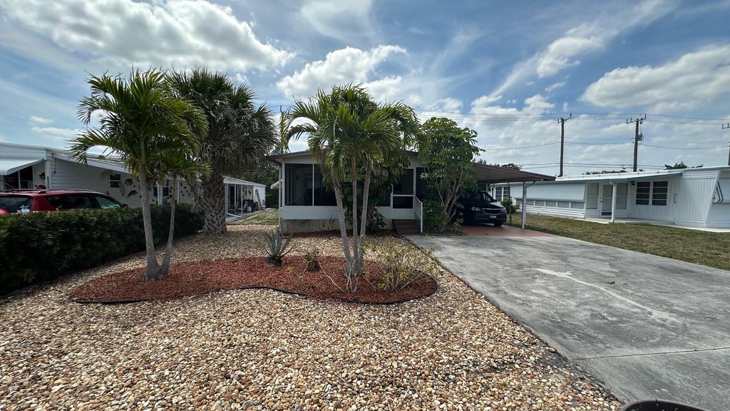 Photo of 8308 SE Swan Avenue, Hobe Sound, FL 33455 (MLS # R10974610)