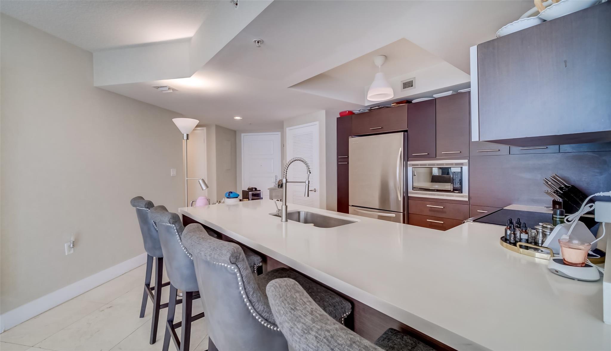 LOCATION!! WALKING DISTANCE TO THE AMAZING BEACH, NEAR BY SHOPS, DINNING AND MORE, ON THE 6TH FLOOR ON TOWER 1, EXTENDED WRAPAROUND BALCONY, MARBLE FLOORING, FRESHLY PAINTED, ALL IMPACT WINDOWS, UNFURNISHED, PET FRIENDLY BUILDING, GYM, POOL, BEACH CLUB, VALET PARKING, PERFECT FOR NEW OWNERS OR INVESTORS. MOVE IN READY!!