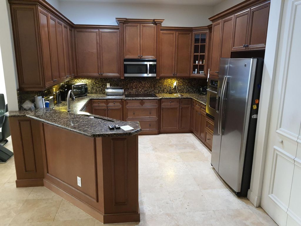Photo of 220 NE 69th Circle, Boca Raton, FL 33487 (MLS # B26044738)