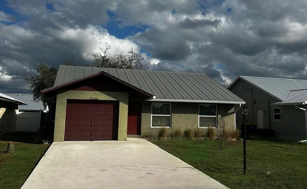 Photo of 5609 SE Katherine Avenue, Stuart, FL 34997 (MLS # R11051604)