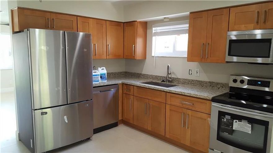 UPDATED KITCHEN, STAINLESS APPLIANCES, WASHER AND DRYER INSIDE, NEW ROOF, IMPACT WINDOWS AND GLASS DOORS. THIS IS A ONE SIDE OF A DUPLEX. NO HOA APPROVAL. SHARED POOL FOR THE DUPLEX. GREAT LOCATION, CLOSE TO BEACH AND I95 & SHOPPING & RESTAURANTS. WILL RENT SOON!