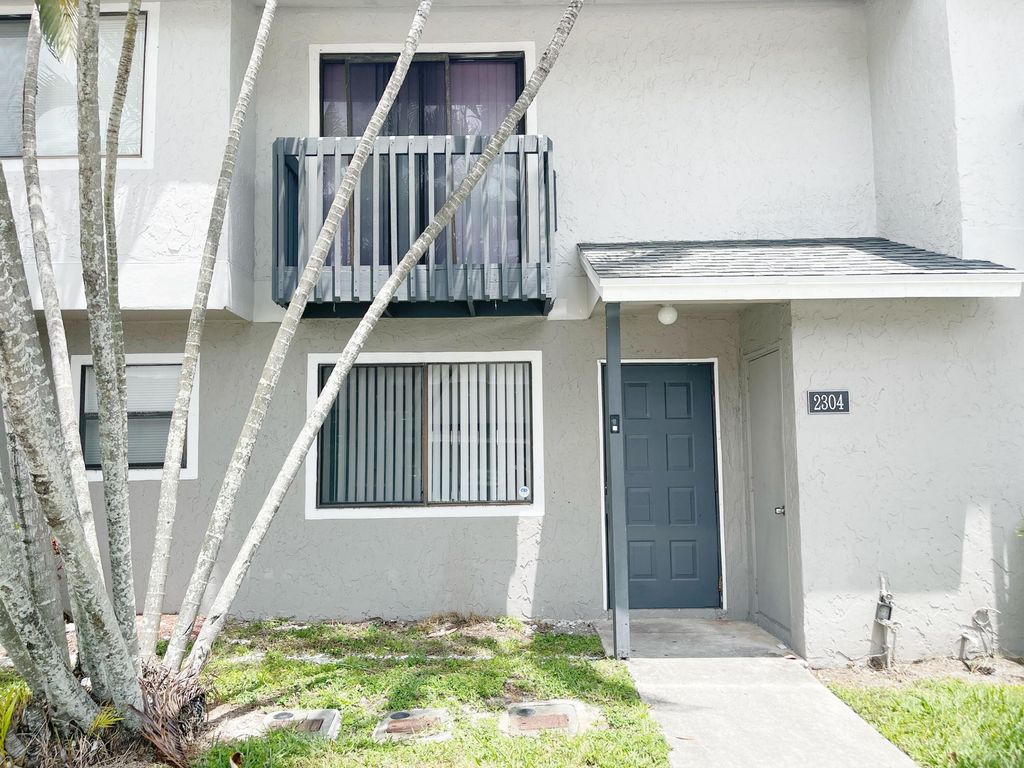 Photo of 2304 Seaside Drive, Greenacres, FL 33463 (MLS # B26021727)