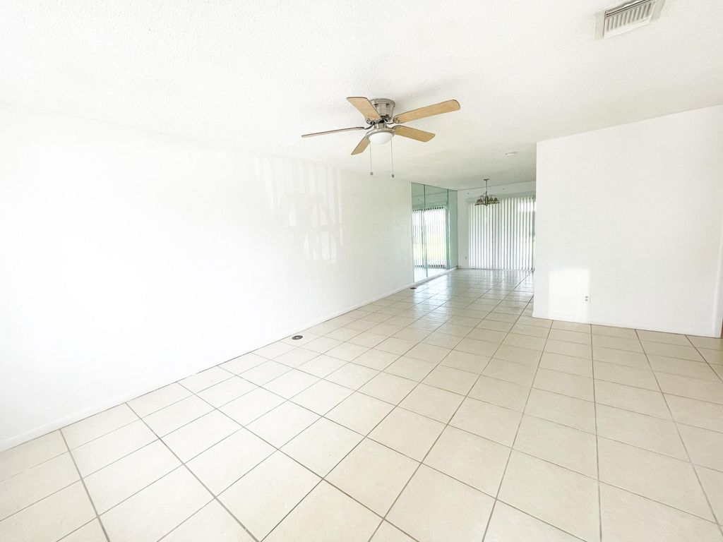 Photo of 2304 Seaside Drive, Greenacres, FL 33463 (MLS # B26021727)