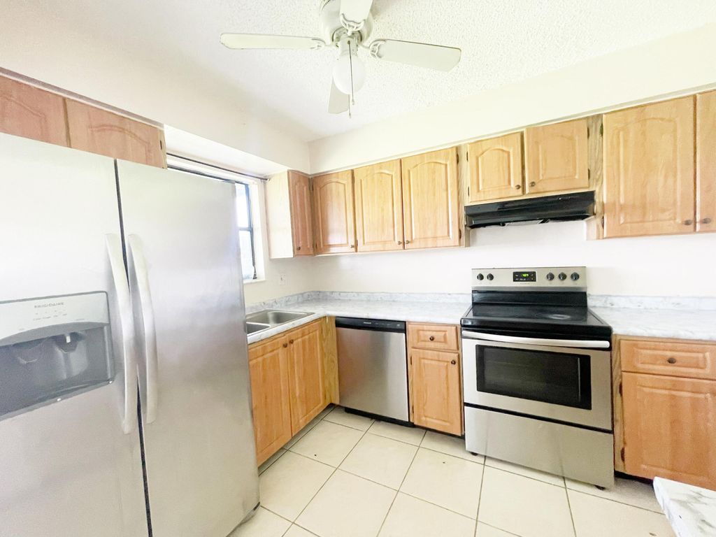 Photo of 2304 Seaside Drive, Greenacres, FL 33463 (MLS # B26021727)
