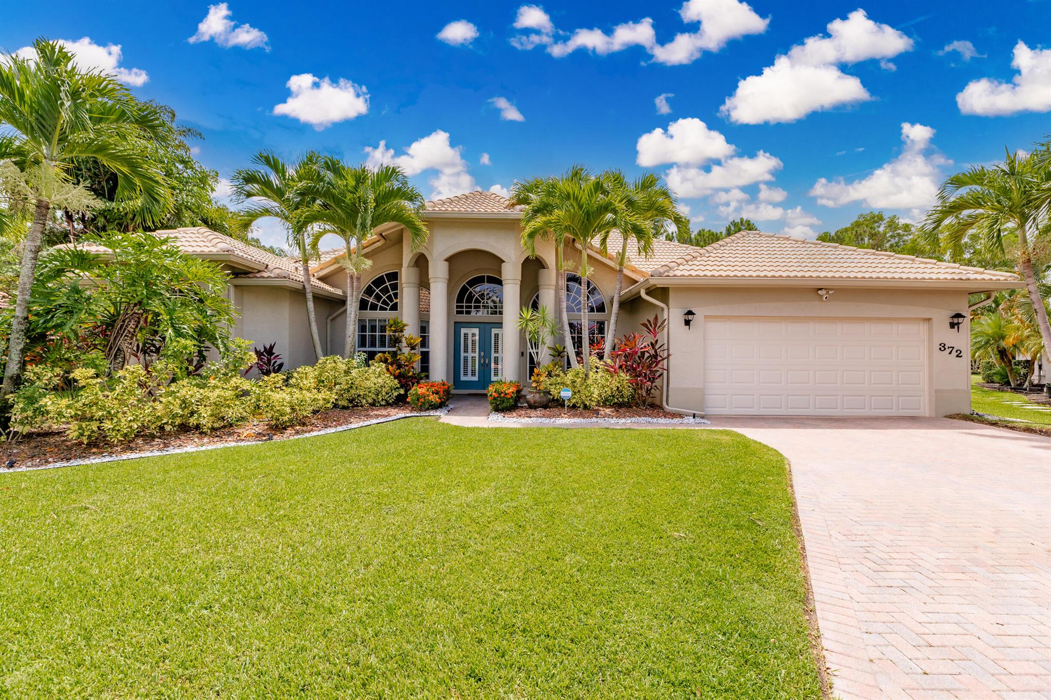 Welcome to 372 SW Egret Landing -- a beautifully renovated 4-bedroom, 2-bath home in the quiet, desirable community of The Sanctuary at Sawgrass Lakes with low HOA Fees. This residence boasts a fully remodeled kitchen and bathrooms, a spacious butler's pantry, and a custom walk-in closet.Enjoy your private resort-style pool and jacuzzi, ideal for entertaining or relaxing in comfort. Thoughtful upgrades include all-new Wi-Fi-connected appliances, a new sprinkler system, a dedicated circuit for EV charger in the garage, a ring security system, and mounted TVs that stay with the home. $7,000 in lender credits when using our preferred lender--perfect for closing costs or a rate buy-down--this home offers both luxury and value. Truly a must-see!