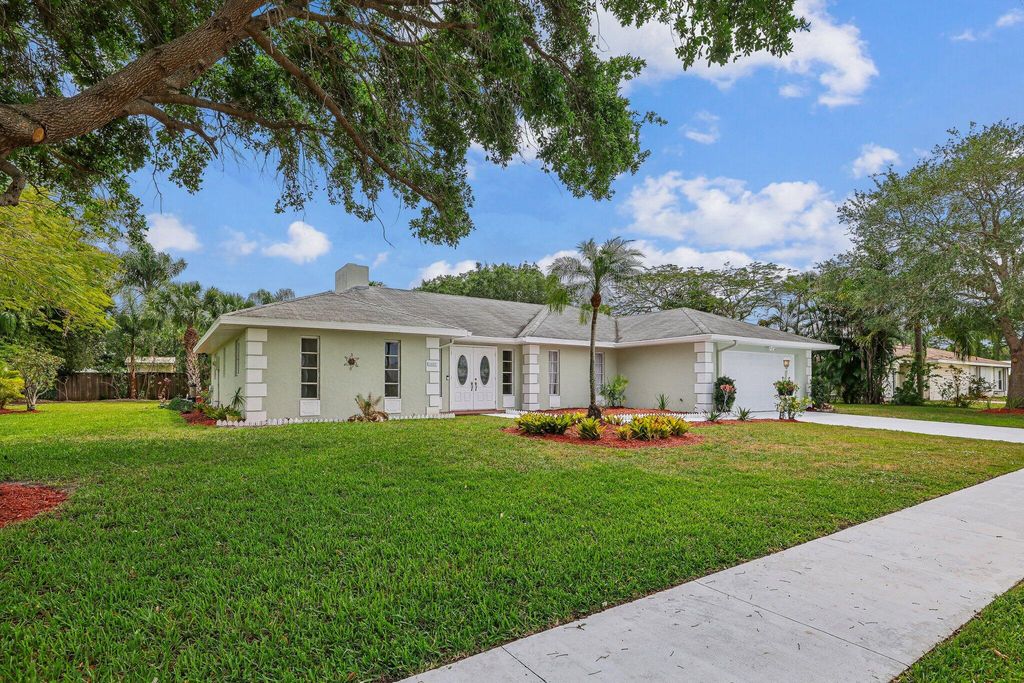 Photo of 2082 SE Erwin Road, Port Saint Lucie, FL 34952 (MLS # R10972670)