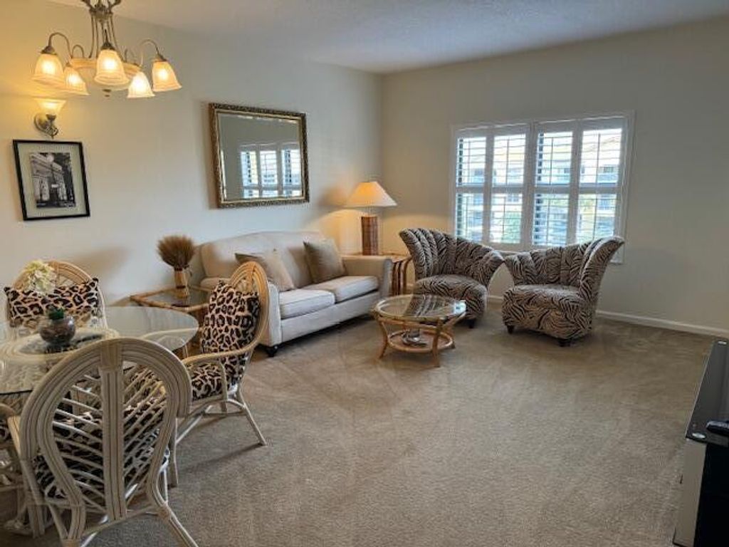 Photo of 500 Uno Lago Drive #403, Juno Beach, FL 33408 (MLS # R10950717)