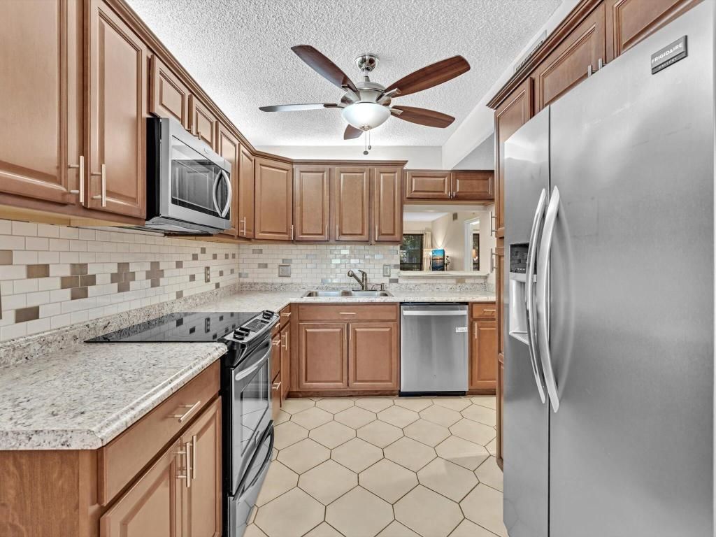 Photo of 10143 Mangrove 203 Drive #203, Boynton Beach, FL 33437 (MLS # R11090960)