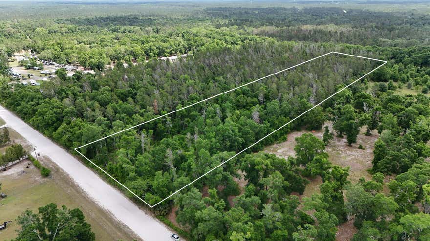 Discover the perfect opportunity to own 10 beautiful acres on Suntilt Court in White Springs. Tucked away in a quiet, rural setting, this expansive property offers plenty of space to build your dream home, establish a private retreat, or invest in land with long-term potential. Surrounded by natural beauty and mature vegetation, this parcel provides privacy while still allowing convenient access to nearby roadways, local shops, and outdoor recreation. Whether you're looking for a homesite, agricultural use, or simply a place to escape the hustle and bustle, this property delivers flexibility and freedom. Enjoy the charm of North Florida living with easy access to the scenic Suwannee River, known for its boating, fishing, and outdoor adventures.Don't miss this chance to own a large tract o