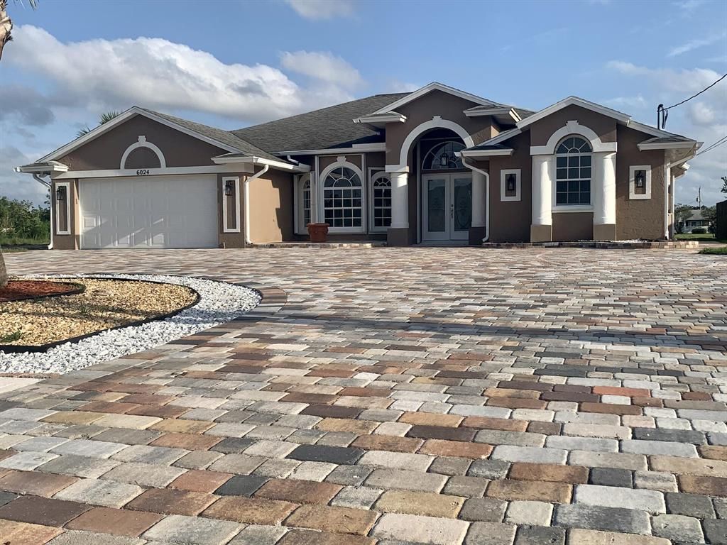 Photo of 6024 NW Favian Avenue, Port Saint Lucie, FL 34986 (MLS # R10710871)