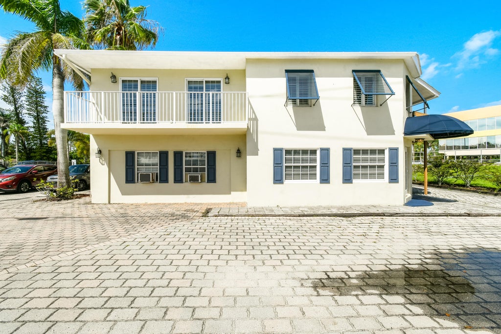 Photo of 850 SW MARTIN DOWNS Boulevard, Palm City, FL 34990 (MLS # B26078703)