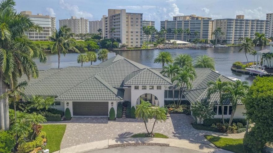 A rarely available Boca Raton dream estate located on an oversized SE point lot directly on the Intracoastal, offering exceptional South and East water views and deep water access. This Contemporary styled estate provides 270 feet of water frontage, yacht dockage, over 5,000 square feet of living space, 5 bedrooms, 5.5 bathrooms, 3 garages, home theatre, home gym/office overlooking the waterway, waterfall pool, spa and endless luxury. The professional landscaping greets you as you approach this extraordinary home. Enter and be impressed by the stunning views of the Intracoastal Waterway.  See 'More' for full details and amenities...